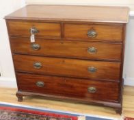 A George III mahogany chest fitted two short drawers and three graduated long drawers on ogee feet