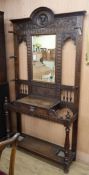 A Victorian carved oak hallstand