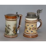 A Mettlach jug decorated with dancers and a stein with floral decoration tallest 20cm