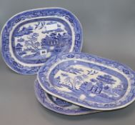 Three blue and white meat plates