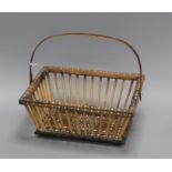 A Ceylonese hardwood and porcupine quill basket length 28cm