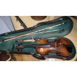 A late 19th / early 20th century Boosey & Co full size violin, cased with 2 bows