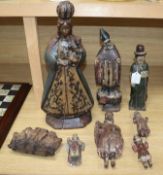 A group of Philippine polychrome carved wood religious figures including a Madonna (8) tallest 48cm