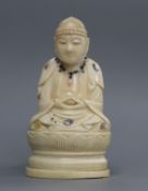 A Japanese signed ivory Buddha with Shibayama decoration 10cm