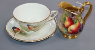 A Royal Worcester cream jug painted with fallen fruits by Harry Ayrton and a 'Stonechat' cup and