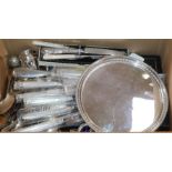 Silver-handled flatware, including a set of six dinner knives, a silver-backed hand mirror and