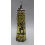 A late 19th century tapered green glass stein enamelled with a figure in period costume height 36cm