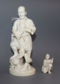 A Japanese Meiji period carved ivory okimono of a fisherman, signed and a small carving of a