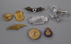 A 9ct gold 'Croydon Musical Festival 1915' shield-form pendant, a BR badge and sundry other badges.