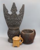A Philippines carved wood storage vessel, a similar grain measure jug and a birch tankard (3)
