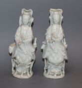 A pair of Chinese porcelain figures of Guanyin, 19th century height 14cm