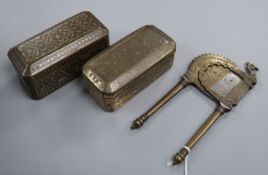 A Philippines silver mounted bronze beetle nut box, a beetle nut cutter and another box
