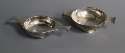 Two plain Scottish silver quaichs, Edinburgh, 1892 and 1929, largest 14.3cm.