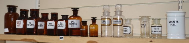 A collection of glass medicine bottles