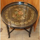 A Toleware occasional table Diameter 62cm