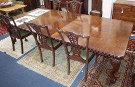 A carved mahogany Chippendale style dining suite, comprising an extending dining table (3 extra
