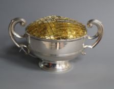 A George V silver rose bowl, Chester, 1914 and a cased set of six silver gilt coffee spoons.