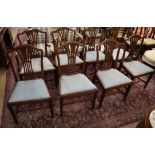 A set of eight George III style mahogany dining chairs