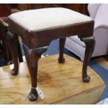An 18th century oak cabriole leg stool with upholstered drop-in seat W.45cm
