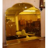 A 1950's frameless amber glass mirror 76cm
