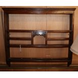 A George III elm hanging plate rack W.112cm, H.102cm