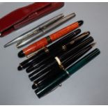 Two Parker sonic pens and six other pens