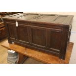 A 17th century panelled oak coffer W.118cm