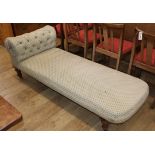 A late Victorian walnut chaise longue