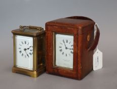 A Mappin & Webb gilt brass carriage timepiece in leather outer case and another carriage timepiece