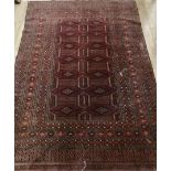 A Caucasian red ground rug 180 x 120cm