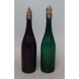 A Regency amethyst decanter and a green glass decanters