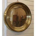 A circular metal framed wall mirror Diameter 56cm