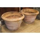 A pair of circular terracotta garden urns Diameter 62cm