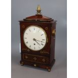 A William IV mahogany timepiece, having circular Roman enamelled dial, the cut brass-inlaid case