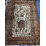 An Afghan prayer rug 212 x 149cm