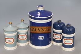 Two ceramic chemist's jars and two blue and a large similar jar