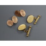 A pair of 18k gold oval and baton cufflinks and a pair of 9ct rose gold oval cufflinks
