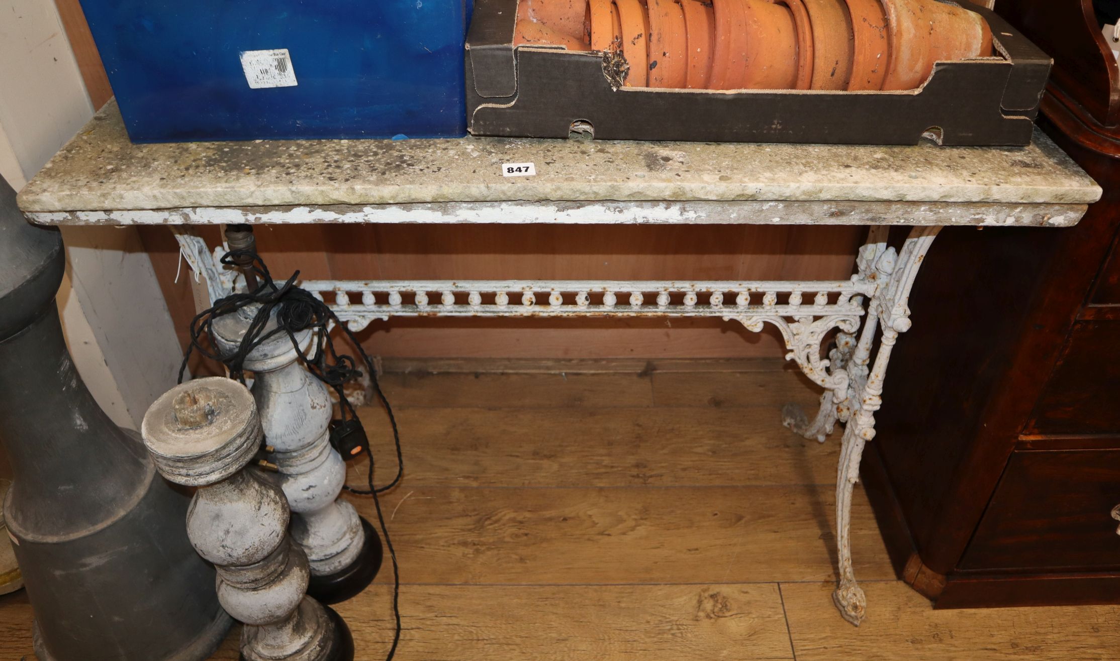 A Victorian marble top cast iron base table W.108cm