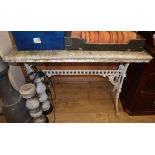 A Victorian marble top cast iron base table W.108cm