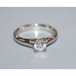 A Mappin & Webb platinum set solitaire diamond ring, size L, with original elaborate Mappin & Webb
