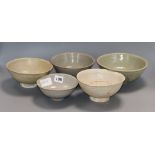 Four Chinese Qingbai bowls and a Longquan celadon bowl, Song - Ming dynasty