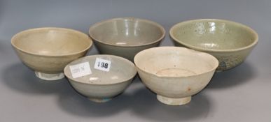 Four Chinese Qingbai bowls and a Longquan celadon bowl, Song - Ming dynasty