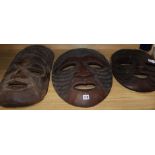 Three Kenyan tribal masks longest 52cm