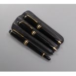 A cased set of three small Mont Blanc pens, in leather case - comprising two ball points and a
