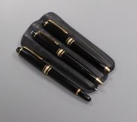 A cased set of three small Mont Blanc pens, in leather case - comprising two ball points and a