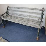 A Victorian slatted cast iron garden bench (missing back foot) W.158cm