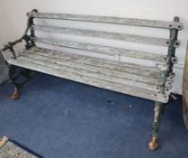 A Victorian slatted cast iron garden bench (missing back foot) W.158cm