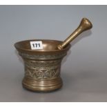 A 17th century bell metal mortar and pestle height 11cm