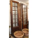 A set of four 19th century French glazed bookcase doors H.270cm