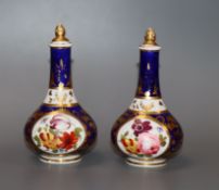 A pair of Derby porcelain scent bottles and stoppers, c.1810